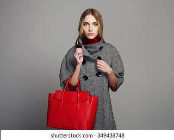 Winter Beautiful Woman With Handbag.Beauty Fashion Girl In Topcoat.Shopping