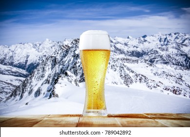 Winter Beer And Landscape Of Alps 