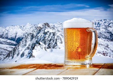 Winter beer and landscape of alps 
