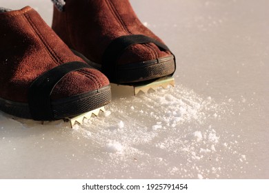 Winter Boots With Affixed Ice Cleats