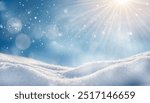 Winter bright background. Christmas landscape with snowdrifts and pine branches in the frost.