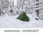 Winter camping in a hot tent in Algonquin Provincial Park 