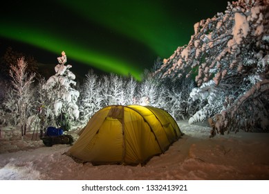 Winter Camping Under The Northern Lights