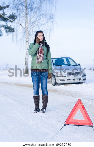 Winter car breakdown - woman call for help,\
road assistance