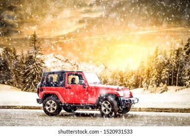 Winter car of red color and landscape of forest with mountains. Free space for your decoration. 