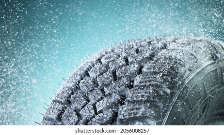 Winter Car Tire With Snow In Detail, Macro Photo, Winter Weather Concept. Free Space For Text.