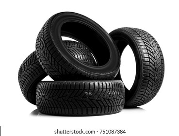 Winter Car Tires. Group Of Tires For Winter Driving On A White Background.