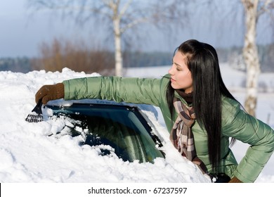 Winter Car - Woman Remove Snow From Windshield With Ice Scraper