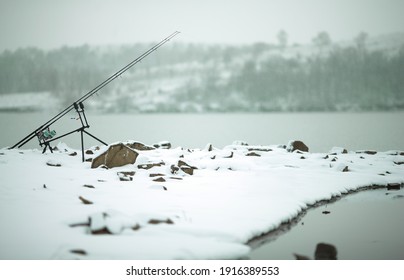 Winter Carp Fishing On The Lake With Fishing Rods