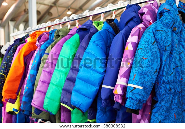 Winter\
children sports jacket on a hanger in the\
store