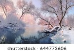 Winter Christmas Landscape In Pink Tones With Calm Winter River, Surrounded By Trees.Winter Forest On The River At Sunset. Landscape With Snowy Trees, Beautiful Frozen River With Reflection In Water