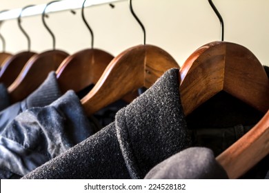 Winter clothes hanged on a clothes rack 