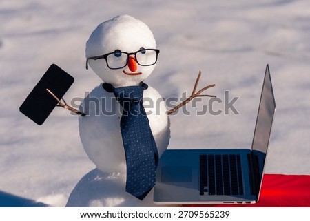 Winter Connection. Snowman Remote Work. Smart Snowman working Online. Winter Phone Sale. Calling Santa. Snow Chat. Snow Man Talks Business. Winter Holiday Greetings Online. New Year Call from Snowman.
