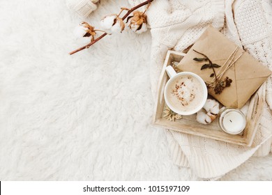 Winter Cozy Background With Cup Of Coffee, Warm Sweater And Old Letters