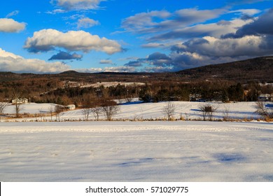 Winter Daytime Scene With Snow, Mountains, Clouds, Trees And Fields. Seated In Hudson Valley, Brunswick NY Outside Of Albany.