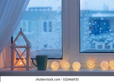 winter decor with candles and garland