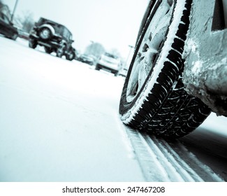 Winter Driving Conditions. Snow Storm, Snow Tires,driving Hazards And Weather Concept.