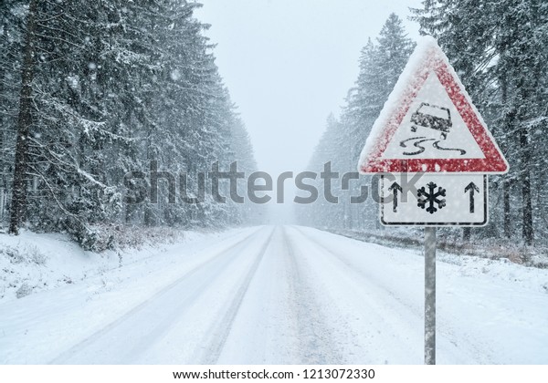 Winter Driving - Heavy snowfall on a country\
road. Driving on it becomes dangerous\
…