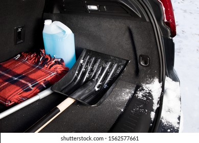 Winter Driving Safety - An Emergency Snow Shovel In The Trunk