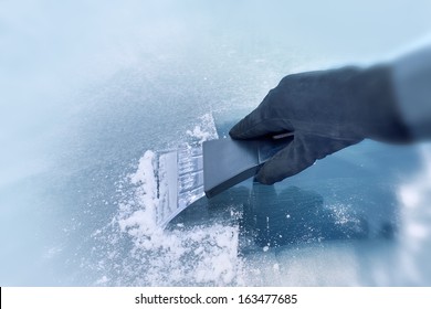 Winter Driving - Scraping Ice From A Windshield