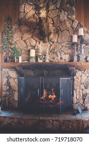 Winter Fireplace Scene At Ski Lodge 
