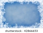 Winter frame of gleaming ice, in the center of the composition aged textured background