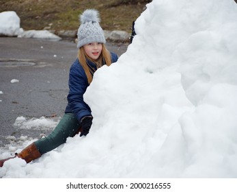 Winter Fun. Cheerful Child In A Hat Plays Snowballs 2020