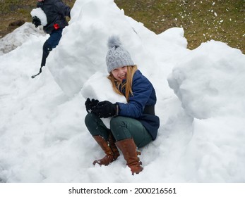 Winter Fun. Cheerful Child In A Hat Plays Snowballs 2020