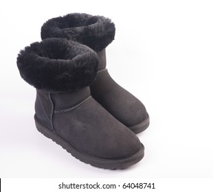 Winter Fur Boots Over White Background