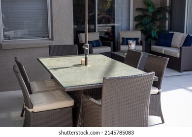 Winter Garden FL United States 4-13-2022: Pollen On Back Patio Outdoor Furniture Table In Spring