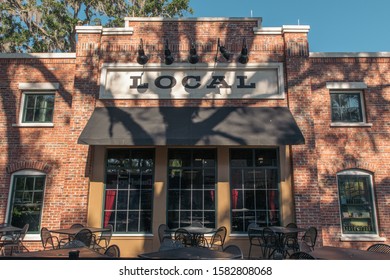 WINTER GARDEN, FLORIDA: MAY 29, 2019 - Local Sign At Plant Street Market A Brick Building Featuring Indoor Dining With Local, Farm Fresh Organic Food, Craft Beer And Outside Seating