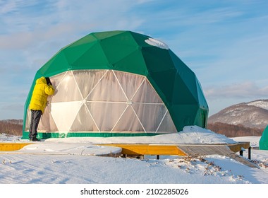 The Winter Glamping And Child In A Yellow Jacket