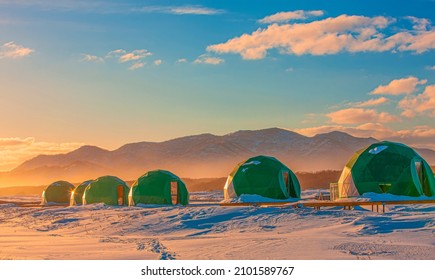 The Winter Glamping At Sunset. Kamchatka Peninsula