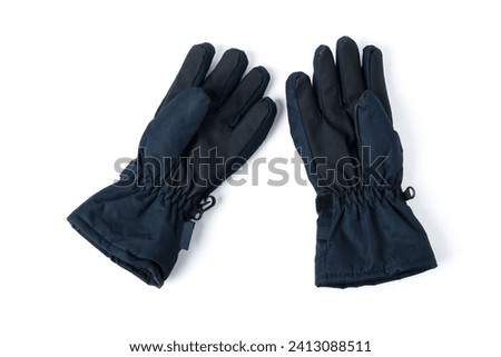 Winter gloves made of water-repellent material for a boy isolated on a white background