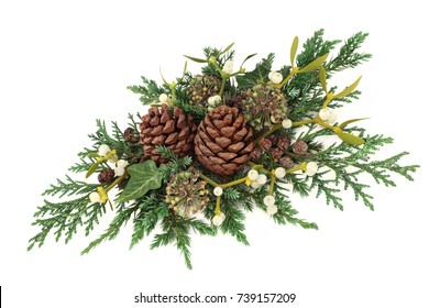 Winter Greenery Decoration With Cedar Cypress And Juniper Leaf Sprigs With Ivy, Mistletoe And Pine Cones On White Background.