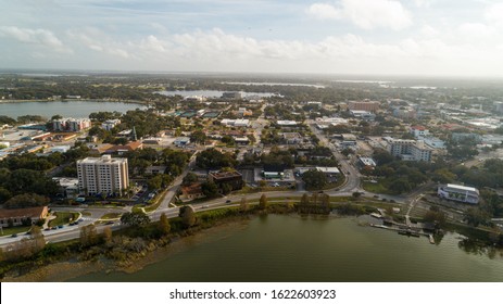 "Winter Haven, FL / USA - 1/12/2020: Aerial drone shot of downtown Winter Haven, FL on a sunny day."