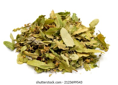 Winter Herbal Tea On A White Background. Linden Tea. Medicinal Tea Prepared From Linden Leaves, Clove Particles And Chamomile