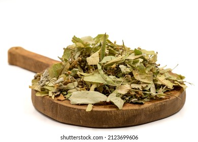 Winter Herbal Tea On A White Background. Linden Tea. Medicinal Tea Prepared From Linden Leaves, Clove Particles And Chamomile