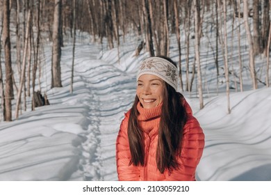 Winter Hiking Portrait Of Happy Woman Smiling In Snow Forest Mountain Landscape Scenery. Asian Woman Hiker Walking In Cold Weather Nature Landscape