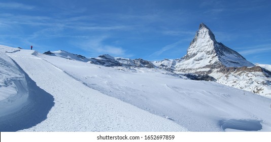 Winter Hiking In Zermatt, Switzerland. The Matterhorn. Well Prepared Hiking Trail.