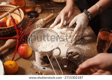 Winter holiday cookie baking process in a cozy home kitchen