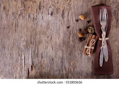 Winter Holiday Dinner Plate Decoration On Old Wood Background. Table Set With A Winter, Christmas Decoration. Winter Holiday Theme.  Happy New Year. Space For Text. 