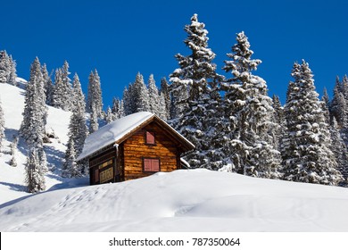 Winter holiday house in swiss alps - Powered by Shutterstock