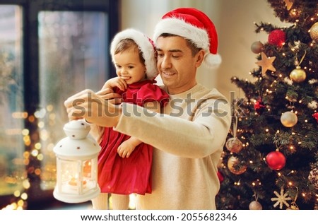 Similar – Image, Stock Photo Child hold christmas lamp with glass and candle inside in the night to pine tree.