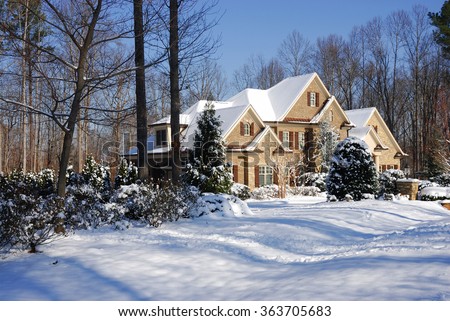 winter home, house in woods after snow in sunny day