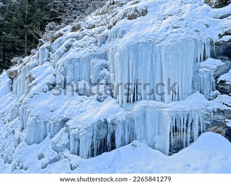 Winter icicles and frozen water formations during harsh winters on the rocks of the Alpstein mountain massif, Alt St. Johann - Switzerland (Schweiz)