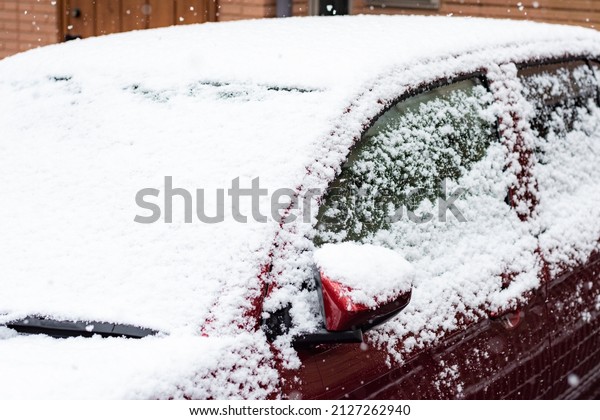 Winter image Snow piled up\
in a car