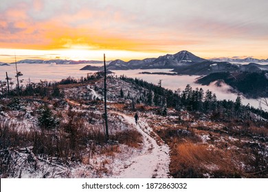 Winter Inversion Clouds In The Mounains At Sunset Time. Seasonal Natural Scene With Fog, Orava Region, Slovak Republic. Travel Destination. Big Choc In The Background.