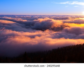 Winter Inversion Clouds In The Mounains At Sunset Time