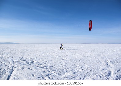 Winter Kite Skiing On The Frozen River